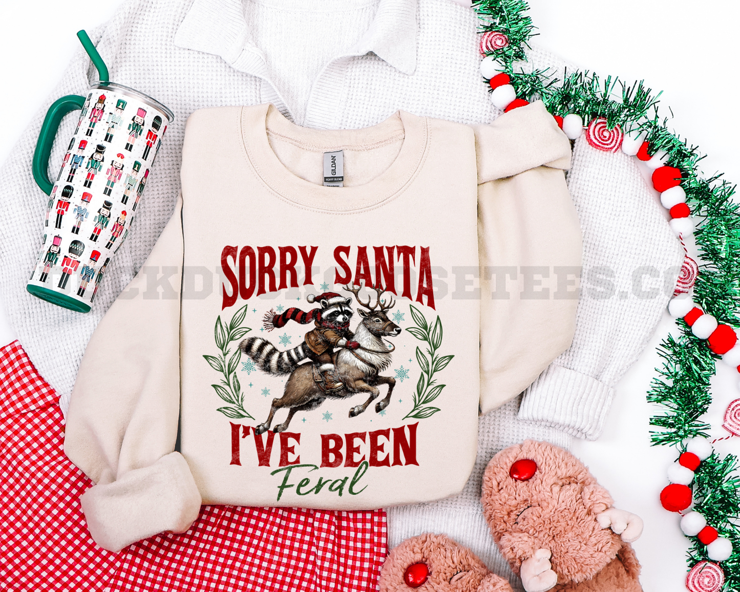 SORRY SANTA I'VE BEEN FERAL- RACCOON RIDING REINDEER